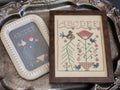 PRE-ORDER 1884 Stitchery Designs - Sitting Pretty